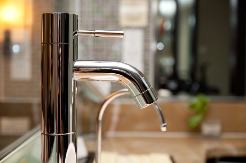 Leaking tap being repaired in Streatham